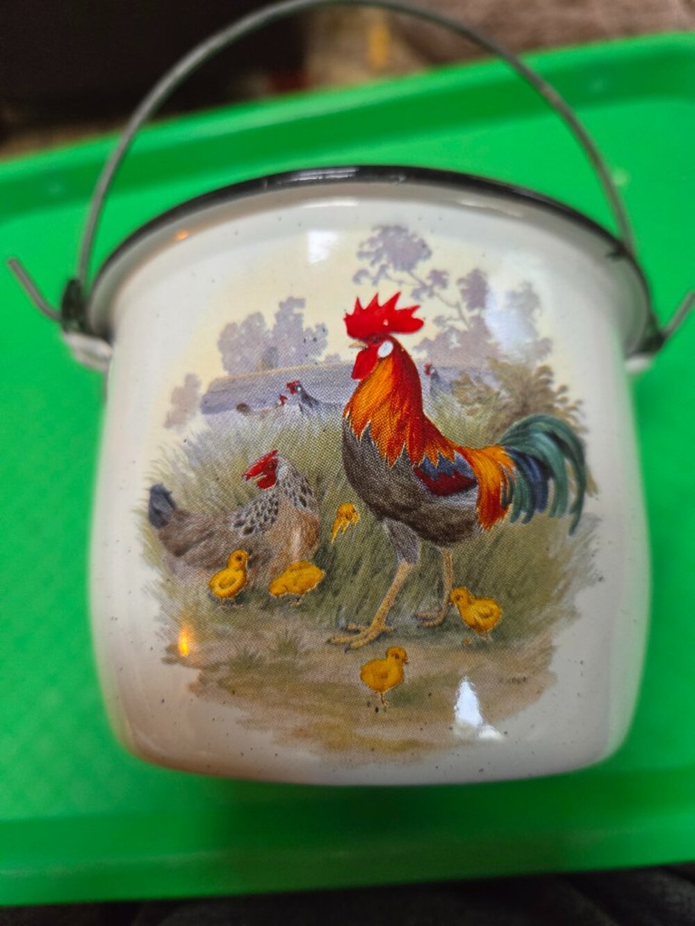 vintage enamelware bucket with a hand painted colorful rooster